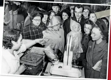  ??  ?? LEFT A crowd gathers at the biscuit counter of the Fenwicks store in Newcastle following the abolition of points rationing announced by Mr Webb The Minister of Food. May 20, 1950