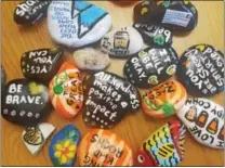  ??  ?? Some of the Kindness Rocks artist Lisa D’Annunzio has handpainte­d and then hidden.