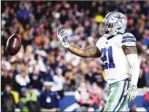  ?? Getty Images/tns ?? Ezekiel Elliott of the Dallas Cowboys celebrates after scoring a 1 yard touchdown in the third quarter against the Los Angeles Rams in the NFC Divisional Playoff game at Los Angeles Memorial Coliseum on Jan. 12 in Los Angeles. Cowboys owner Jerry Jones is currently in a standoff with running back Ezekiel Elliott.