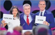  ?? AFP ?? IOC chief Thomas Bach (centre) with Paris Mayor Anne Hidalgo and Los Angeles Mayor Eric Garcetti in Lima on Wednesday.