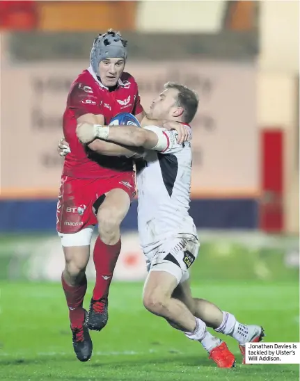  ??  ?? Jonathan Davies is tackled by Ulster’s Will Addison.