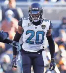  ?? KEVIN C. COX/GETTY IMAGES ?? Jacksonvil­le’s Jalen Ramsey reacts after his fumble-return touchdown Sunday.