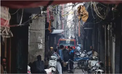  ??  ?? MAJOR FIRE: Officials said it was very difficult to access the dark, poorly lit premises in the commercial hub of Sadar Bazar.