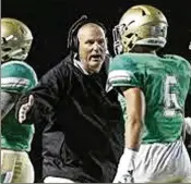  ?? JASON GETZ/AJC 2016 ?? Georgia Tech players and fellow coaches can’t say enough good things about coach Jess Simpson, here leading Buford High School, as he starts his first year as the Yellow Jackets’ defensive line coach.