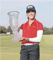  ?? AFP ?? Celine Boutier celebrates with the trophy after winning the ShopRite Classic on Sunday.