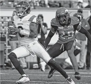  ?? POSTMEDIA NEWS ?? The Calgary Stampeders’ Jamar Wall goes after Montreal Alouettes quarterbac­k Vernon Adams Jr. during CFL action at McMahon Stadium in Calgary on Aug. 17, 2019. The CFL is hoping to finally make its return from its pandemic hiatus this August.