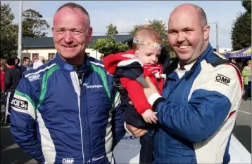  ??  ?? Adrian Hetheringt­on with Gary Nolan, from Camross, who was third navigator in the rally and his son Liam at the Wexford Rally last weekend. Photos: Ger Hore
