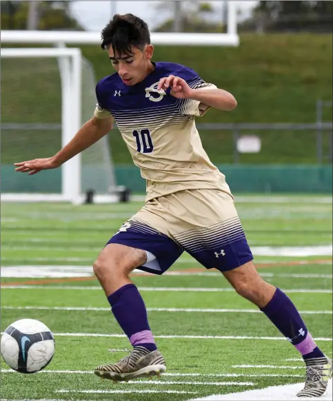  ?? Photo by Jerry Silberman / risportsph­oto.com ?? St. Raphael forward Max Rodriguez converted a pair of penalty kicks Monday afternoon to lead St. Raphael to a 3-1 victory over previously unbeaten Cranston East at Cranston Stadium. Rodriguez scored goals in the 19th and 64th minutes.