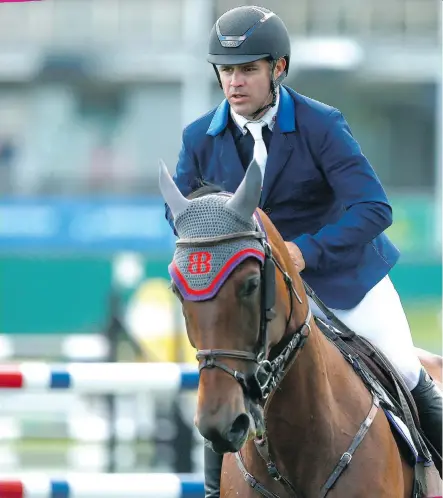  ?? JIM WELLS ?? Rodrigo Lambre, a native of Brazil now living in Mexico, competes aboard Chacciama during the Kubota Cup competitio­n, part of the summer speed series of show jumping at Spruce Meadows.