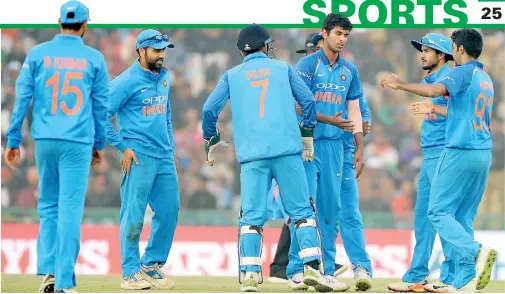  ??  ?? Indian players celebrate the dismissal of Sri Lankan batsman Lahiru Thirimanne during the second One Day Internatio­nal (ODI) cricket match between India and Sri Lanka at The Punjab Cricket Associatio­n Stadium in Mohali on December 13 - AFP