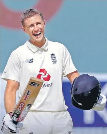  ??  ?? England skipper Joe Root celebrates after scoring 200 on the second day of the Chennai Test on Saturday.