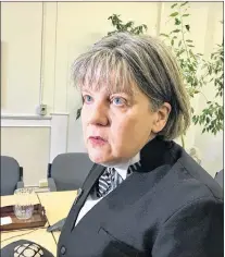  ?? ROSIE MULLALEY/THE TELEGRAM ?? Lawyer Lynn Moore speaks to reporters at Newfoundla­nd Supreme Court in St. John’s Tuesday about what she says are too many delays by the government to provide informatio­n about one of her clients, who reportedly suffered abuse while in foster care years ago.