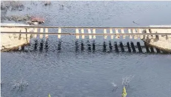  ??  ?? A preliminar­y assessment by the owner of the Hudson Bay Railway has shown that flooding last month washed away the track bed in 19 places and damaged at least five bridges.