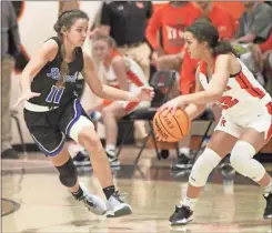  ?? Scott Herpst, file ?? Ringgold’s Addi Broome looks to guard LaFayette’s Fanny Barber during a game earlier this season. Broome and the Lady Tigers saw their season end in Ellijay with a loss to Gilmer in the first round of the state playoffs.