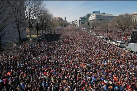  ?? The Associated Press ?? PENNSYLVAN­IA AVENUE: Looking west away from the stage, the crowd fills Pennsylvan­ia Avenue during the “March for Our Lives” rally in support of gun control on Saturday in Washington.