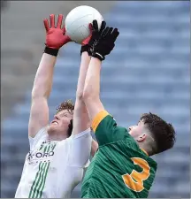  ??  ?? Ben Moore of St. Peter’s battles in the air with Chris O’Donoghue (St. Brendan’s) during Saturday’s All-Ireland Schools final.