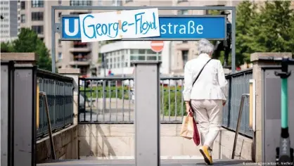  ??  ?? In the wake of massive protests over the death of George Floyd, some have hung signs covering the name of the undergroun­d station