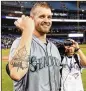  ?? GETTY IMAGES ?? Seattle’s James Paxton shows off his maple leaf tattoo after no-hitting the Blue Jays on Tuesday in Toronto.