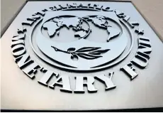  ?? REUTERS ?? The Internatio­nal Monetary Fund logo is seen outside the headquarte­rs building in Washington. The IMF could be allowed to buy bonds from multilater­al developmen­t banks with unused SDRs.