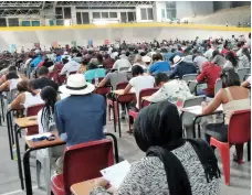  ?? PICTURE: IAN LANDSBERG ?? HELPING HAND: UWC students writing exams. Ninety-three students have benefited from the financial aid campaign.