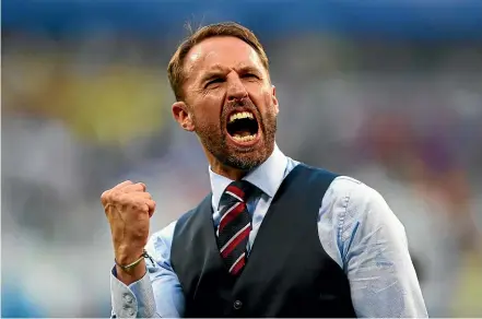  ?? GETTY IMAGES ?? England manager Gareth Southgate reacts after beating Sweden in the World Cup quarterfin­als.
