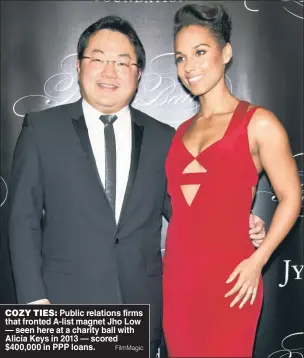  ?? FilmMagic ?? COZY TIES: Public relations firms that fronted A-list magnet Jho Low — seen here at a charity ball with Alicia Keys in 2013 — scored $400,000 in PPP loans.