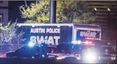  ?? RICARDO B. BRAZIELL/AUSTIN AMERICAN STATEMAN ?? The scene outside a Round Rock-area hotel near where authoritie­s said the suspect in a string of Austin bombings died on Wednesday.