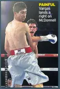  ??  ?? PAINFUL Vargas lands a right on McDonnell