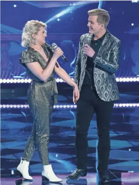  ?? ERIC MCCANDLESS/ABC ?? Real-life couple Maddie Poppe and Caleb Lee Hutchinson returned to “Idol” this season for a Disney-themed performanc­e.