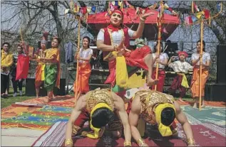  ?? Photograph­s by Anik Rahman For The Times ?? DANCERS perform in Clemente Park during April’s Khmer New Year Celebratio­n in Lowell, Mass. The textile mill city saw the arrival of thousands of Cambodian refugees in the ’70s.