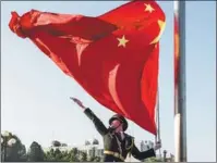  ?? PHOTOS PROVIDED TO CHINA DAILY ?? Above: Enoch Wong Yi-lok hosts a recruitmen­t talk for Tsinghua University’s Schwarzman College in 2019. Left: Wong takes a leading role in a national flag-raising ceremony at Tsinghua University in 2020 as a member of the university’s honor guard.