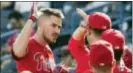  ?? MATT ROURKE — THE ASSOCIATED PRESS ?? The enthusiasm and emotion of youngsters like rookie back-up first baseman Brock Stassi, left, should complement the experience of the veterans being counted on to make the Phillies competitiv­e this season.