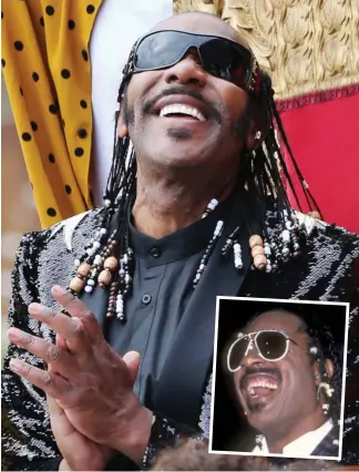  ??  ?? Copycat: Sir Lenny Henry yesterday and (inset) soul singer Stevie Wonder