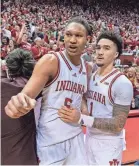  ?? TREVOR RUSZKOWSKI/USA TODAY SPORTS ?? Malik Reneau (5) and Jalen Hood-Schifino celebrate Indiana’s home upset of Purdue.