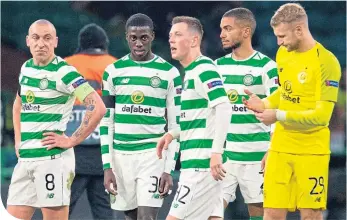  ??  ?? Dejection was written all over the faces of the Hoops players at Celtic Park