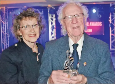 ?? SALLY COLE/THE GUARDIAN ?? Garnet Buell, shown here with his partner Mary MacQueen Elliott, received the Stompin’ Tom Award Sunday at the ECMA 2017 Industry Awards in Saint John, N.B. The award was created to honour all those who have made a long-term contributi­on to the East...