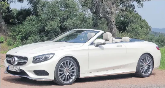  ?? PHOTOS: LESLEY WIMBUSH/DRIVING ?? With its long, aristocrat­ic nose, the muscular-yet-refined 2017 Mercedes-Benz S-550 Cabriolet is designed for quiet driving — top up or top down.