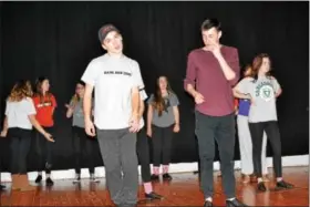  ?? SUBMITTED PHOTO ?? Ethan Rapp, who plays Ren McCormack, and Jared Pinkham, who plays Willard Hewitt, rehearse a scene from “Footloose.”