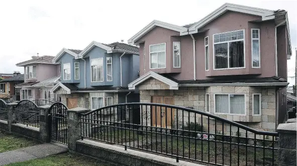  ?? NICK PROCAYLO/PNG FILES ?? The director of civil forfeiture wants to seize three Vancouver homes at 1226, 1228 and 1238 East 63rd Ave. that it alleges the ‘Sanghera Crime Group’ used as a base for criminal activities, including drug-related and violent offences.
