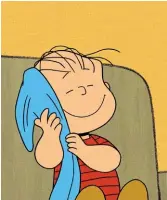  ??  ?? Comfort blanket: Linus van Pelt snuggles up in Peanuts