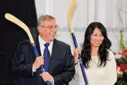  ?? Gary Wiepert/Associated Press ?? Buffalo Sabres’ owner Terry Pegula and his wife, Kim Pegula, pose for cameras during groundbrea­king ceremonies at First Niagara Center in Buffalo, N.Y., in 2013.