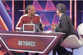  ?? LOU ROCCO/ABC ?? Snoop Dogg is among the celebritie­s who pair up with contestant­s to climb the heights of “The $100,000 Pyramid.”