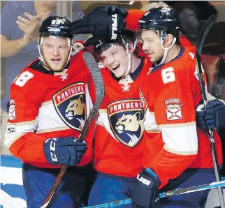  ?? WILFREDO LEE/THE ASSOCIATED PRESS FILES ?? Florida Panthers prospect Owen Tippett, centre, scored a goal and had 17 shots — only once did he fail to register a shot — in seven NHL games for the Panthers.