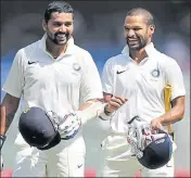  ?? HT PHOTO ?? India coach Ravi Shastri said Vijay (L) brings in solidity at the top while Shikhar adds variety as an opener.