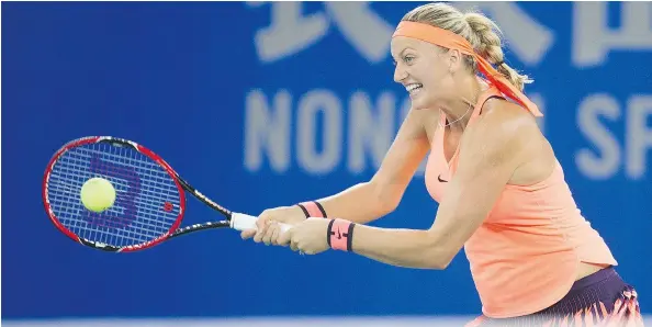  ?? — THE ASSOCIATED PRESS ?? Petra Kvitova returns a shot during her women’s singles final match against Dominika Cibulkova Saturday.