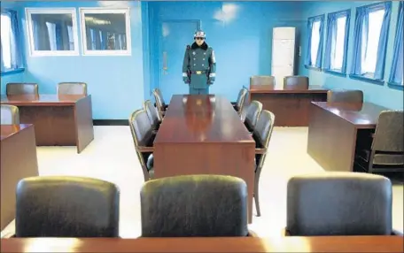  ?? Wally Santana Associated Press ?? THE LEADERS of North and South Korea are to meet at the Peace House in the demilitari­zed zone. Above, a meeting room in the DMZ.