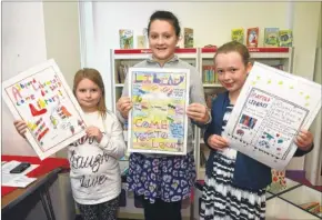  ?? Pictures: Gary Browne FM4543007 ?? Poster competitio­n winners Holly Van de Peer, Abbey-Rose Hill and Charlotte Gibson