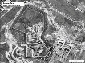  ?? CONTRIBUTE­D BY U.S. STATE DEPARTMENT ?? The U.S. State Department said a building (lower right) in a prison complex near Damascus, Syria, was modified to support a crematoriu­m. The satellite image was taken in April. President Donald Trump is weighing options for Syria.