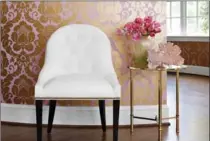  ?? THIBAUT, TNS ?? Thibaut’s Marlow wallpaper has a large-scale pattern in a mauvey pink ground with a pretty, metallic gold damask.