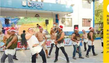  ?? PHOTO BY ALAN TANGCAWAN ?? PARTY
COPS: Cebu City officers perform during their Christmas party.